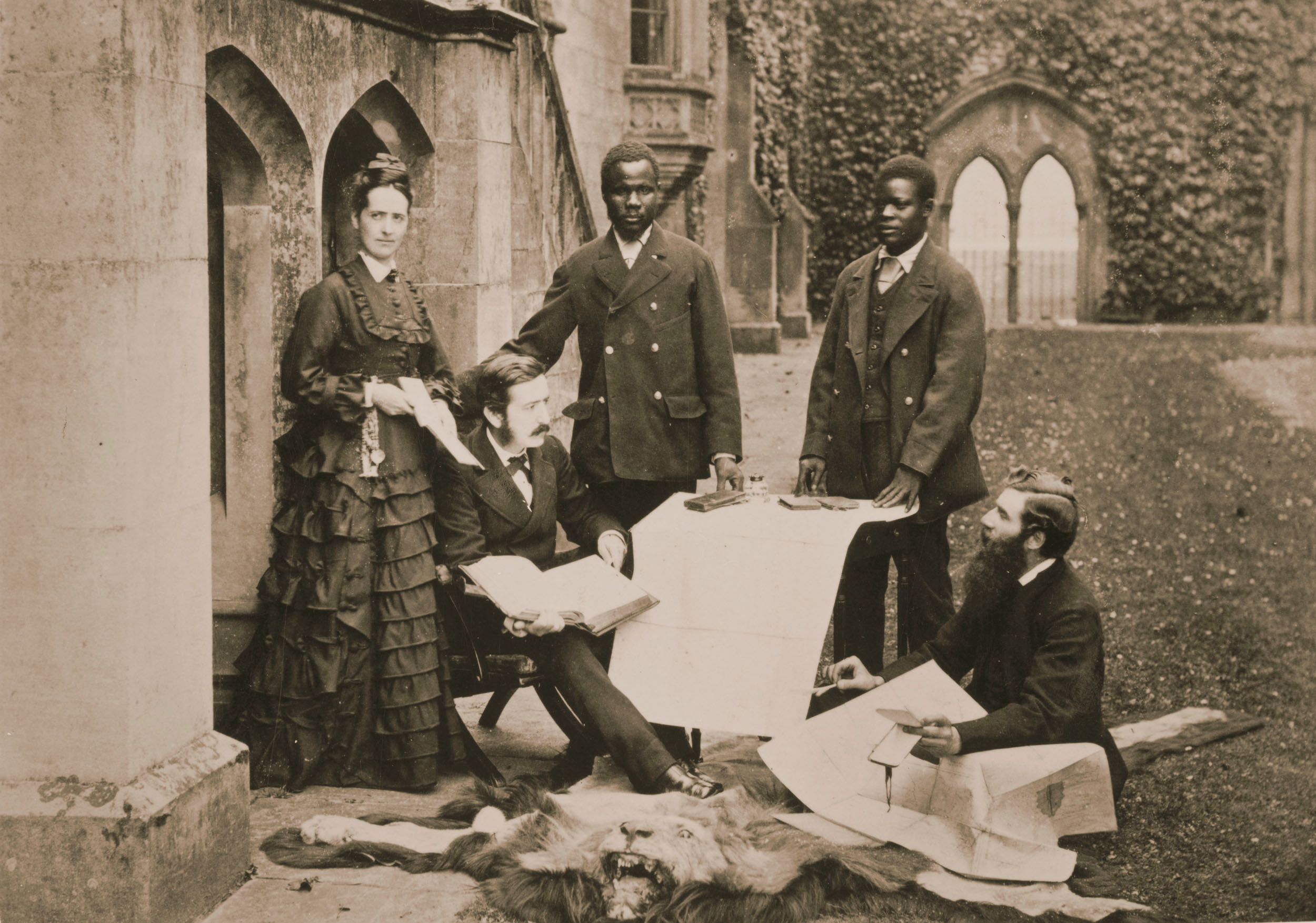Agnes and Thomas Livingstone, Daughter and Son of David Livingstone, Abdullah Susi, James Chuma, and Rev Horace Waller at Newstead Abbey, Nottingham, Discussing the Journals, Maps, and Plans Made by the Late David Livingstone, 1874. SOAS Library, University of London. Copyright Council for World Mission. Used by permission for private study, educational or research purposes only. Agnes and Thomas Livingstone, Daughter and Son of David Livingstone, Abdullah Susi, James Chuma, and Rev. Horace Waller at Newstead Abbey, Nottingham, Discussing the Journals, Maps, and Plans Made by the Late David Livingstone, 1874. SOAS Library, University of London. Copyright Council for World Mission. Used by permission for private study, educational or research purposes only.